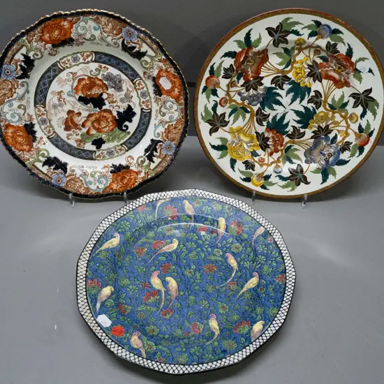 3 display plates, all with stick on wall hangers covering details - one is Doulton Persian Ware, others floral, one