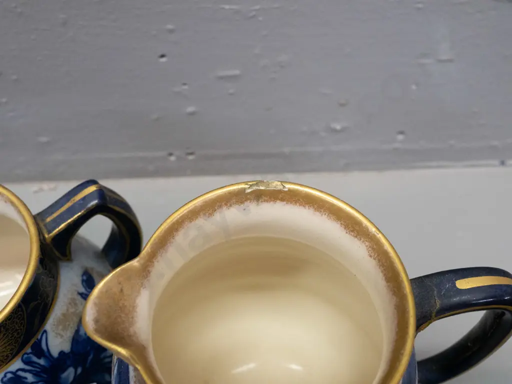 6 pieces Royal Doulton Burslem Blue Iris: 2 jugs, vase, duo, saucer - repairs to taller jug, H-140 Image 1++