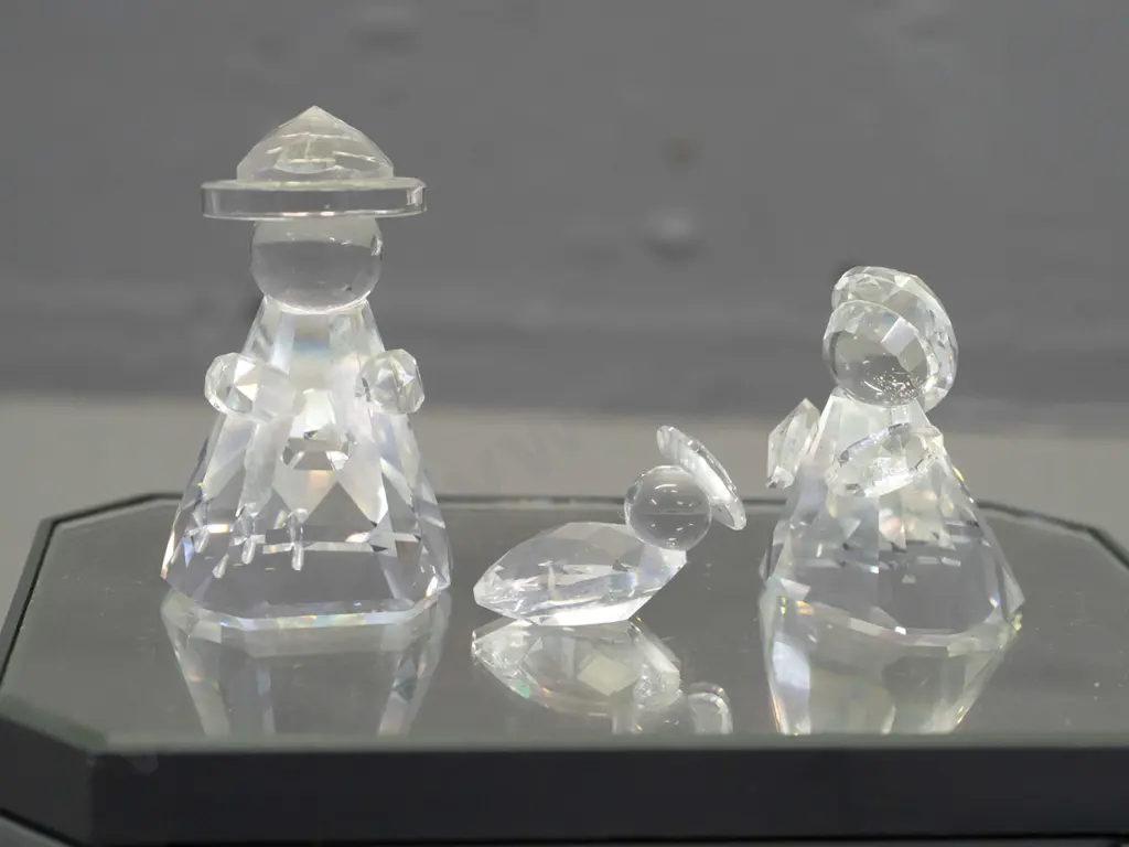 Swarovski crystal mini nativity group of 3 figures, with original box, on mirrored stand. Joseph is H-45 Image 1++