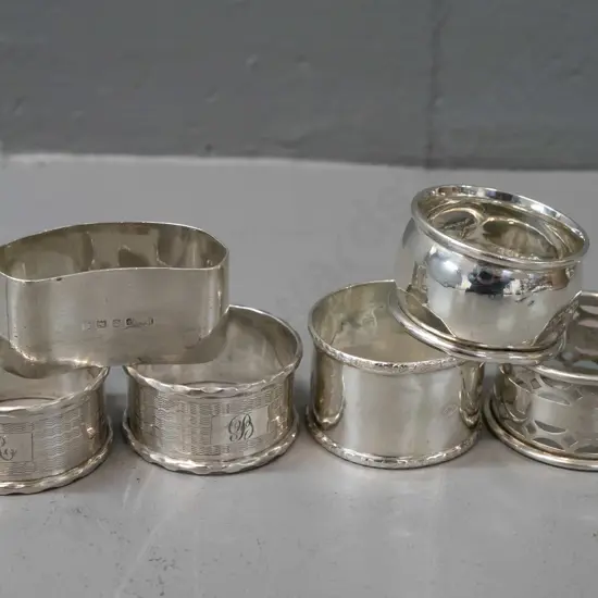 6 assorted vintage napkin rings - all hallmarked sterling silver - pierced one has missing piece in banding (95gm)