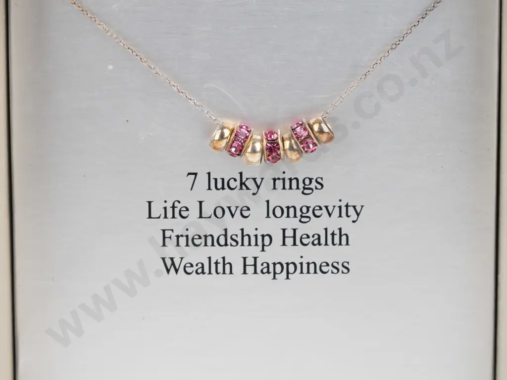 silver necklace with 7 rings stamped 925 Image 1++