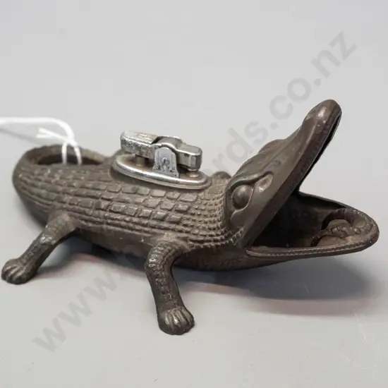 cast metal stylized alligator or lizard combination table lighter / ashtray. Some corrosion to chrome lighter H-75 L-150