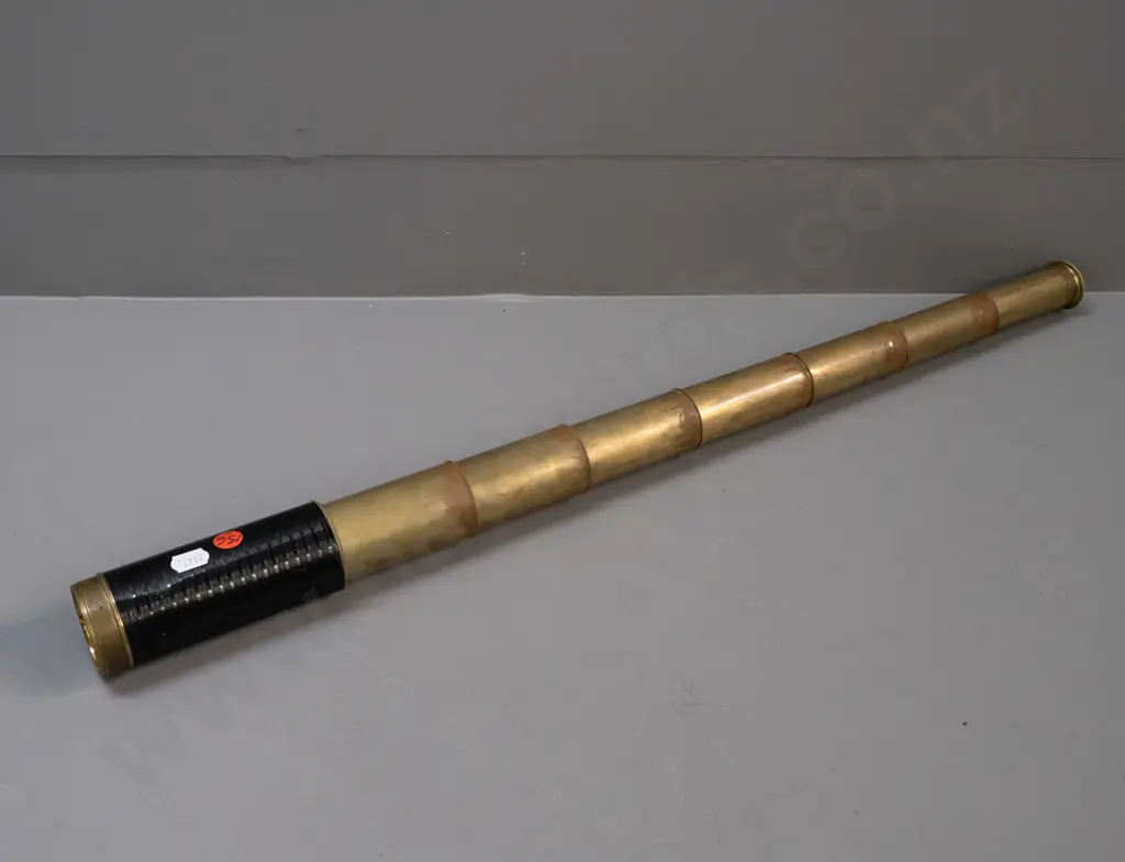 vintage brass pocket telescope with 8 sections, hard black textured covering, eyepiece section marked Elliott 56 Strand Image 1++