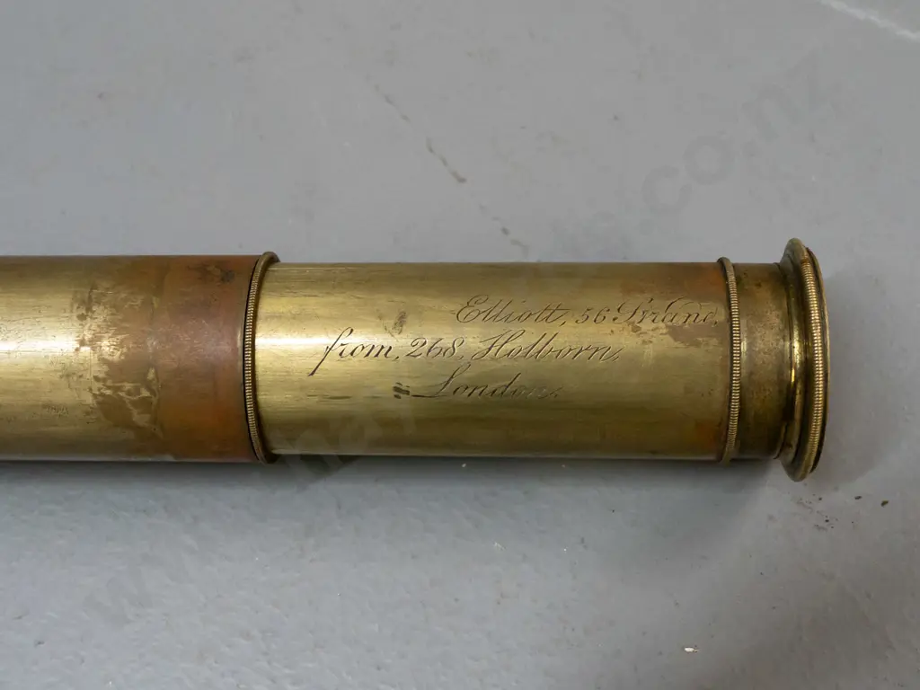 vintage brass pocket telescope with 8 sections, hard black textured covering, eyepiece section marked Elliott 56 Strand Image 1++