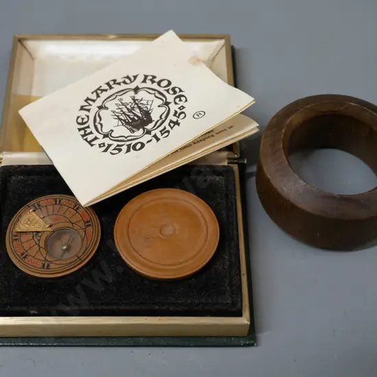 cased Mary Rose replica pocket sundial with pamphlet and a teak ring with plaque - from teak of HMS Iron Duke, Admiral