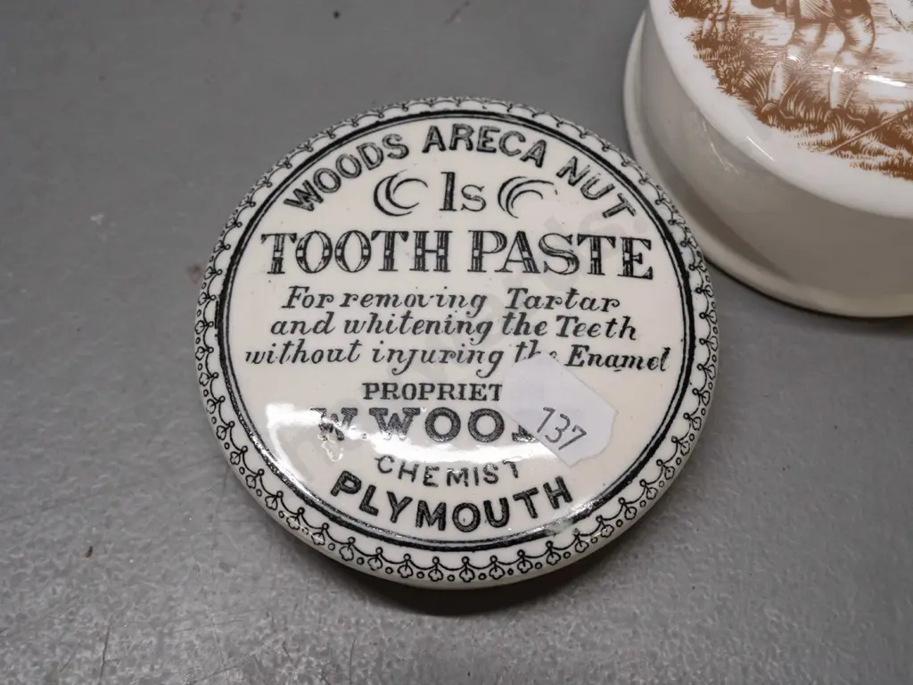 2 English toothpaste lids - White Rose and Wood's Areca Nut - and a lidded canister with fishing scene on lid, marked Image 1++