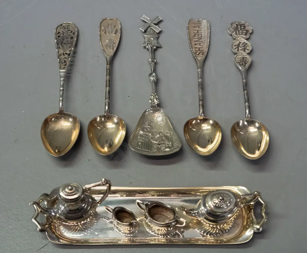 miniature silver plated tea set on tray, and assorted small asian spoons, may be unmarked silver, one marrked Shanghai, Image 1++