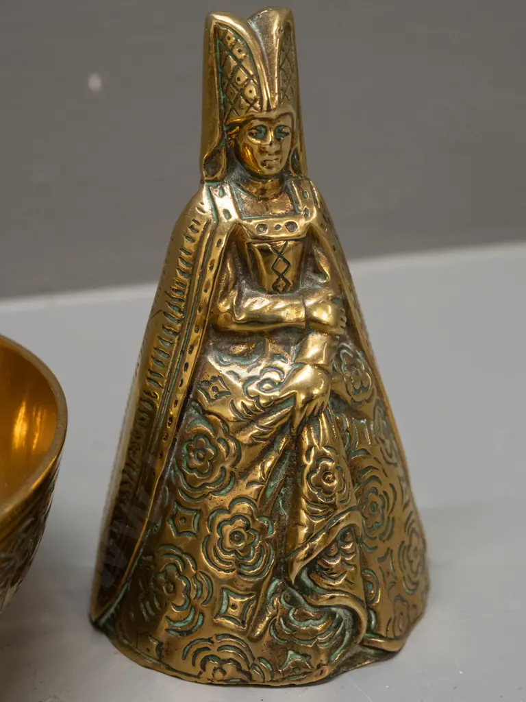 2 brass items - bell with nice ringing tone - woman in Elizabethan dress H-100 and an etched bowl with middle eastern Image 1++