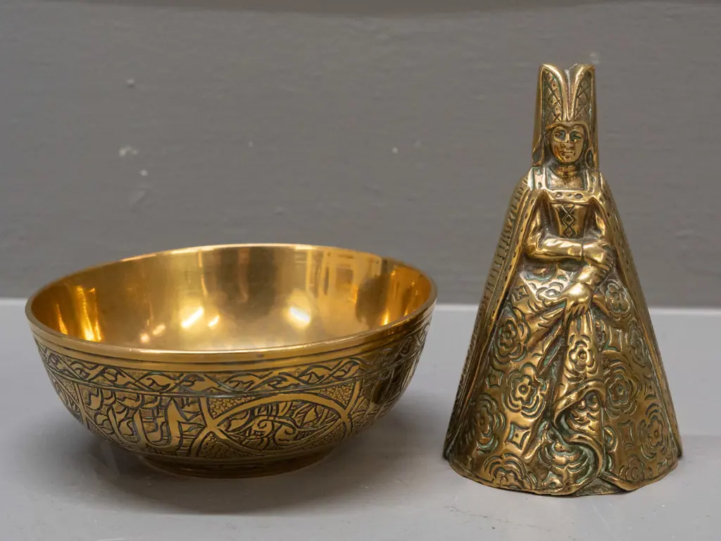 2 brass items - bell with nice ringing tone - woman in Elizabethan dress H-100 and an etched bowl with middle eastern Image 1++