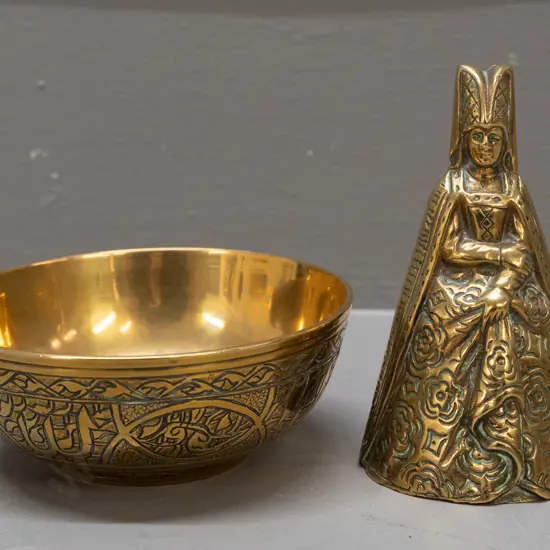 2 brass items - bell with nice ringing tone - woman in Elizabethan dress H-100 and an etched bowl with middle eastern