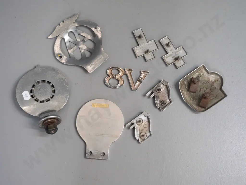 assorted car badges - 2 AA badges, one with AA AUckland markings, Holden 186, V8, Morris Minor Dunedin 2000 convention Image 1++