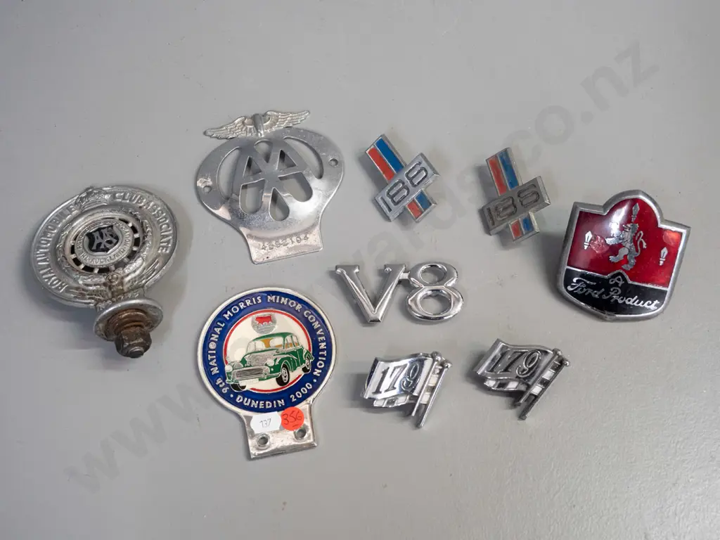 assorted car badges - 2 AA badges, one with AA AUckland markings, Holden 186, V8, Morris Minor Dunedin 2000 convention Image 1++