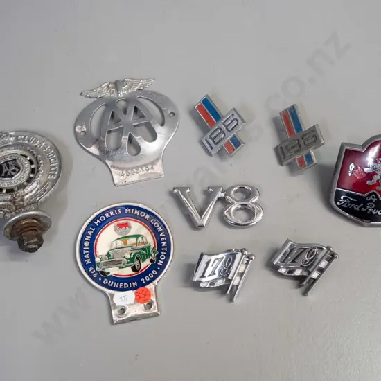 assorted car badges - 2 AA badges, one with AA AUckland markings, Holden 186, V8, Morris Minor Dunedin 2000 convention