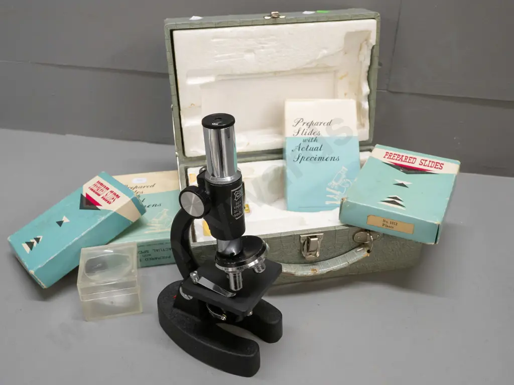 vintage cased hobby microscope with boxed specimen slides, 2 eyepieces - microscope marked C.O.C. H-220 Image 1++