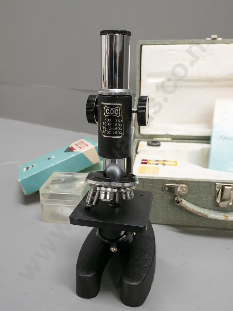 vintage cased hobby microscope with boxed specimen slides, 2 eyepieces - microscope marked C.O.C. H-220 Image 1++