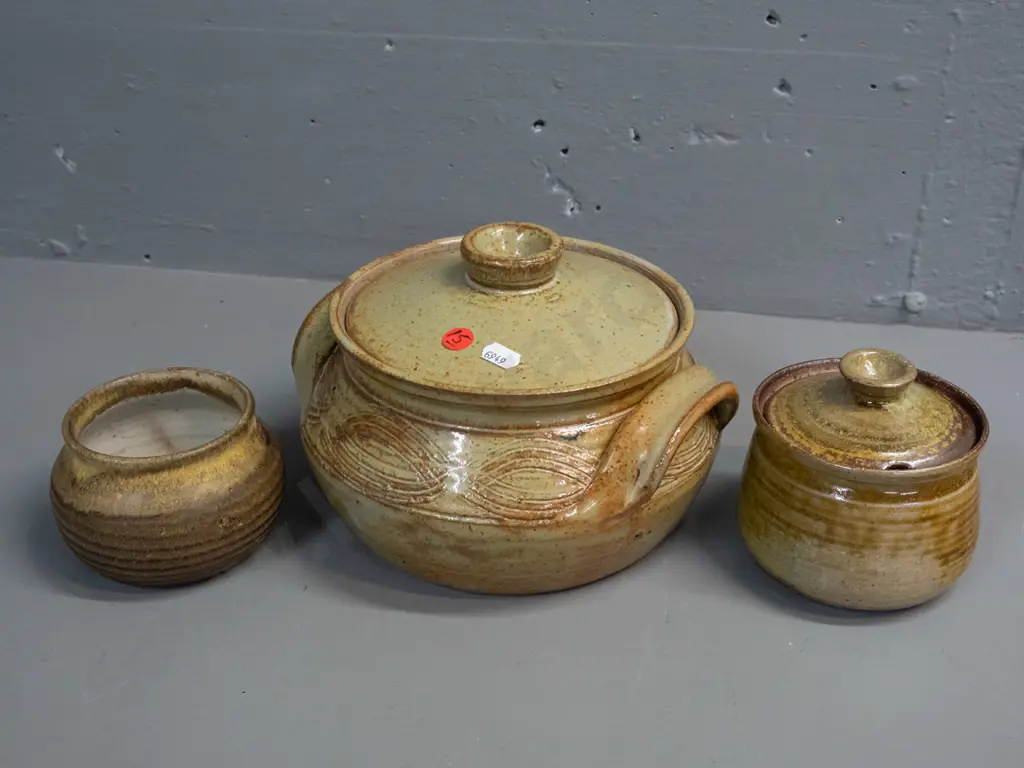 3 pieces of New Zealand studio pottery - lidded casserole marked KM on base, lidded sugar or honey and small pot, both Image 1++