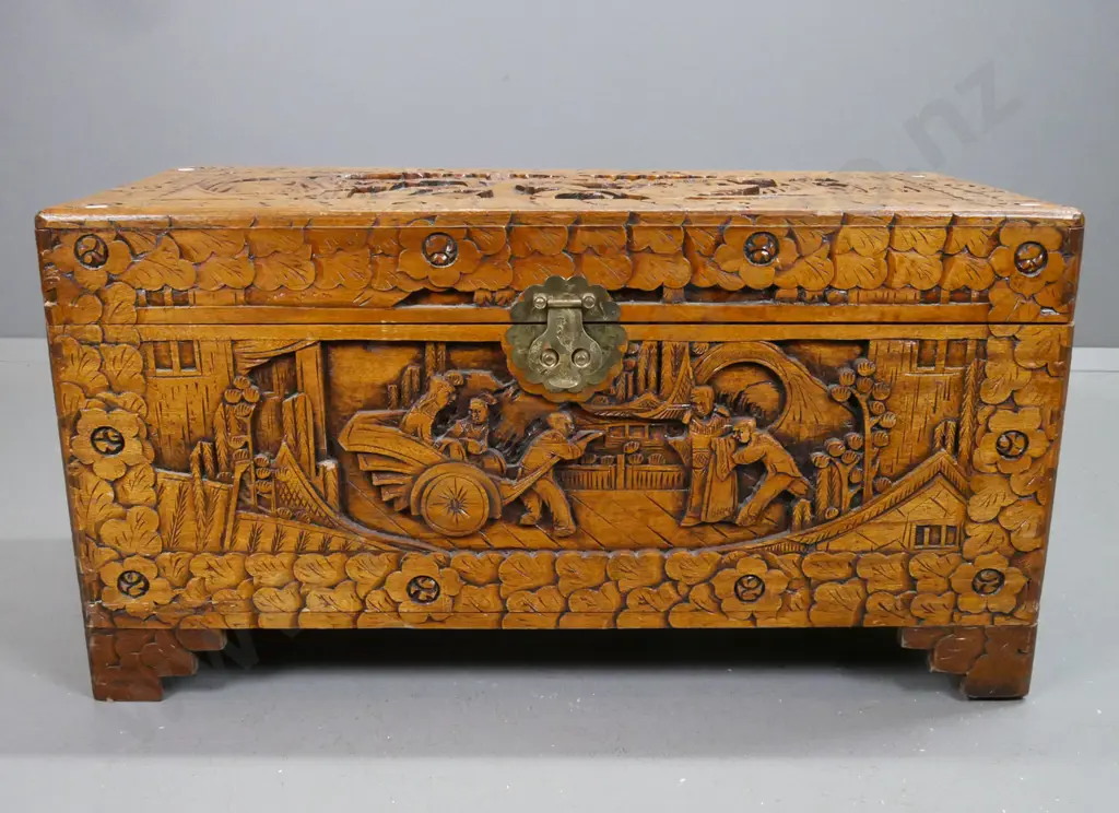 Chinese carved camphorwood chest with brass latch and lock - shrinkage of top on front edge, chip to carving on front Image 1++