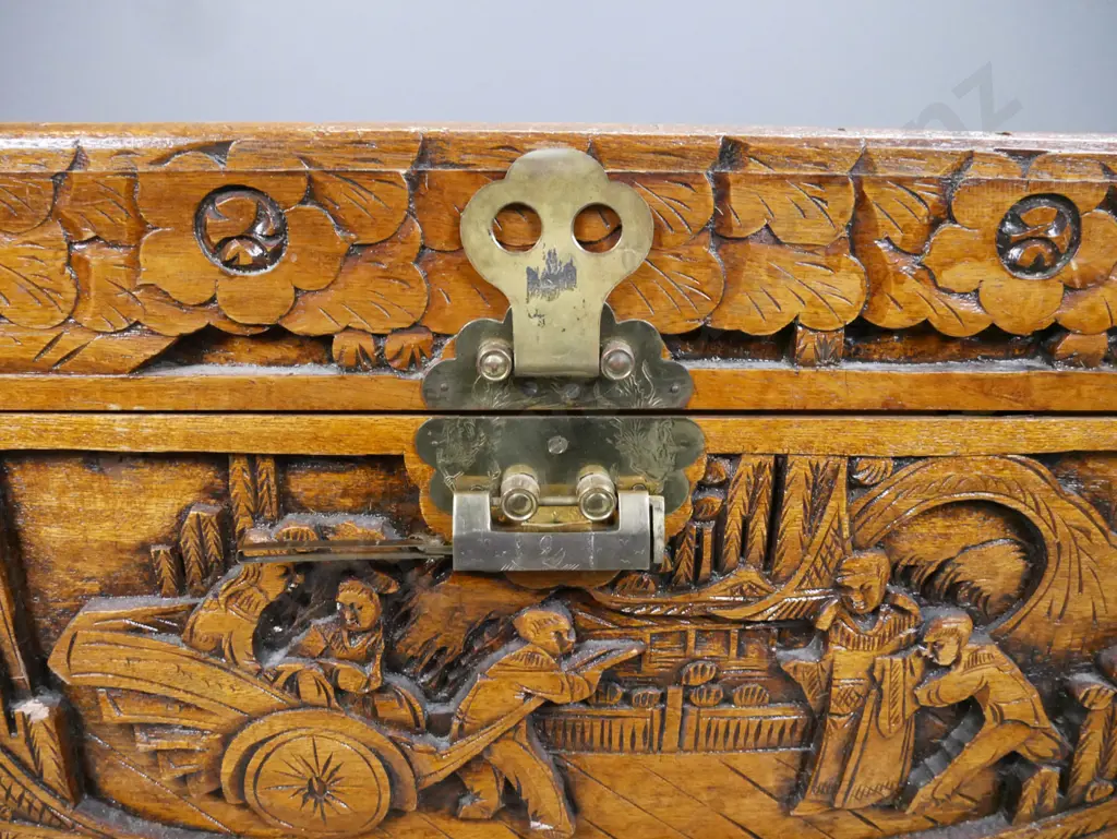 Chinese carved camphorwood chest with brass latch and lock - shrinkage of top on front edge, chip to carving on front Image 1++