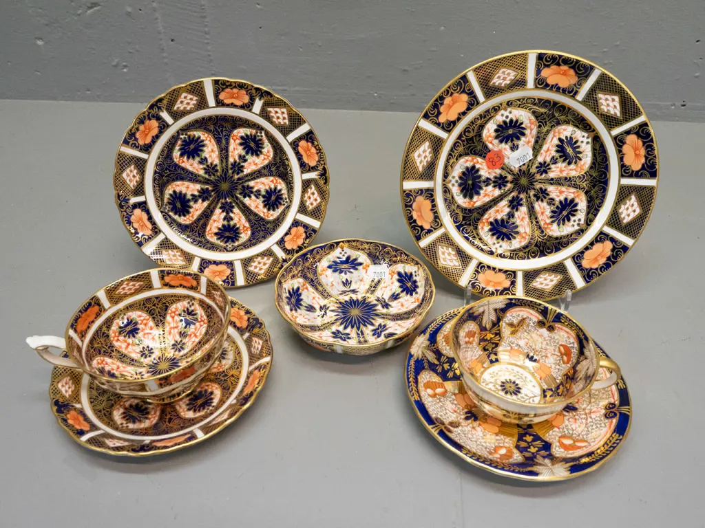 4 pieces Royal Crown Derby imari pattern items - trio, cup & saucer, side plate, dish, all in varying imari styles, Image 1++
