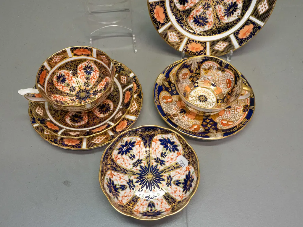 4 pieces Royal Crown Derby imari pattern items - trio, cup & saucer, side plate, dish, all in varying imari styles, Image 1++