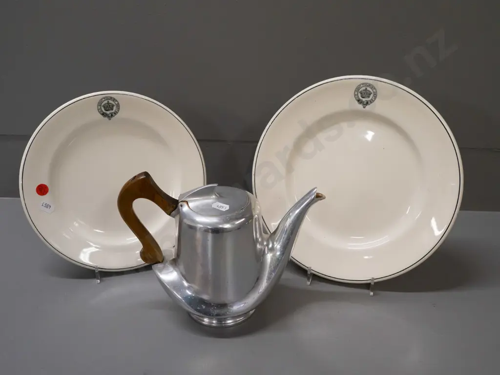 2 Royal Doulton plates with New Zealand Government Tourist Department logo and a deco Picquot ware teapot with wood Image 1++
