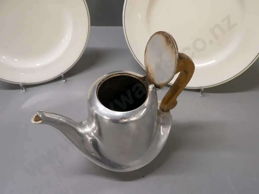 2 Royal Doulton plates with New Zealand Government Tourist Department logo and a deco Picquot ware teapot with wood Image 1++
