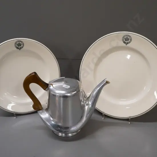 2 Royal Doulton plates with New Zealand Government Tourist Department logo and a deco Picquot ware teapot with wood