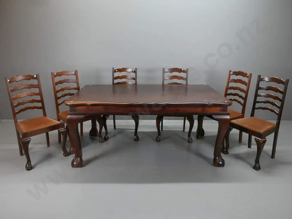 mid-century continental style walnut and fruitwood dining table with shaped edge to top, large sweeping cab legs on ball Image 1++