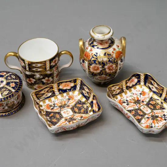 5 Imari pattern china items - 4 Royal Crown Derby - 2 pin dishes, small lidded canister and double handled cup - and a