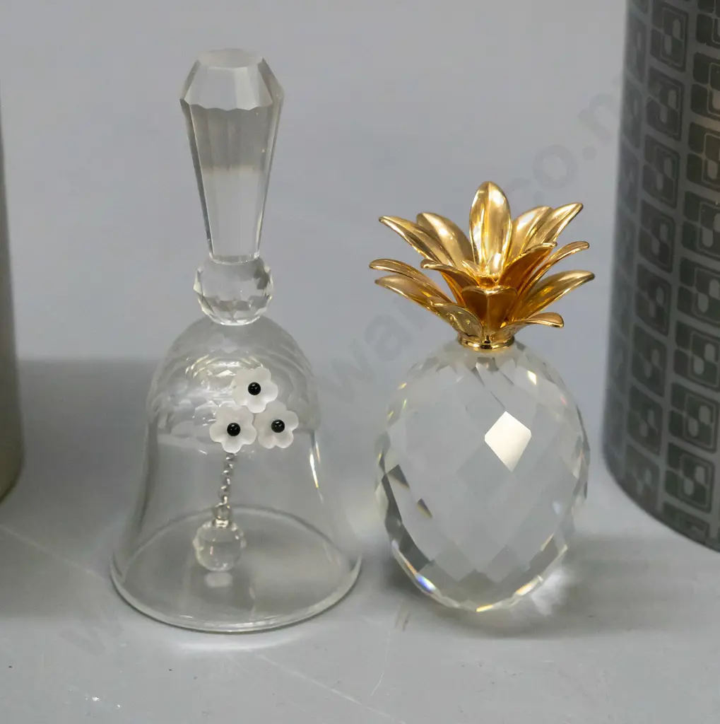 2 Swarovski crystal ornaments - bell with applied flowers and pineapple with gilded leaf top, both with original boxes. Image 1++