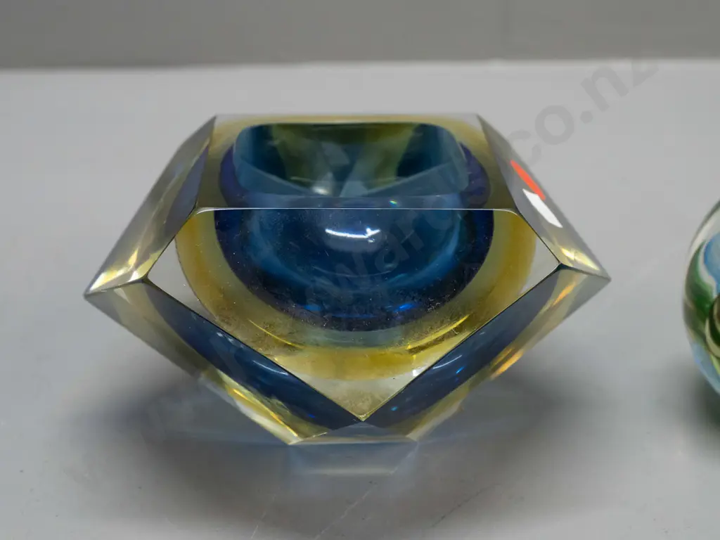 2 pieces of heavy art glass - globe shaped paper weight marked Del Matto 2000 and a geometric faceted yellow and blue Image 1++