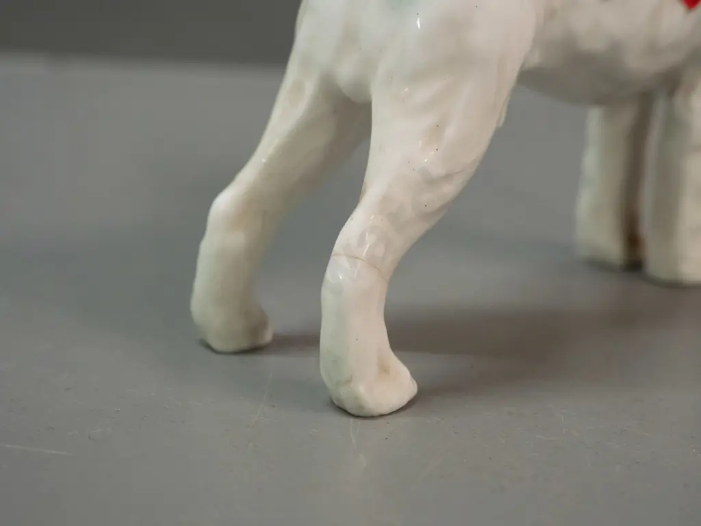 2 small dog figures - Beswick terrier and a larger Royal Doulton Airedale with a repaired back leg H-100 L-120 Image 1++
