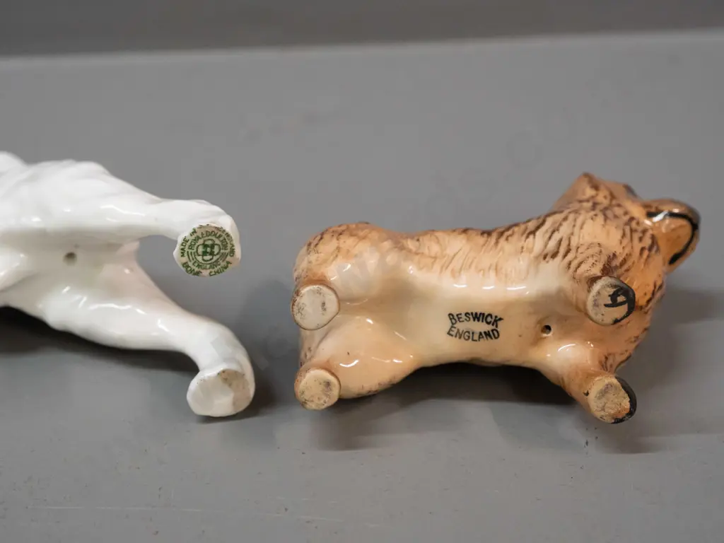 2 small dog figures - Beswick terrier and a larger Royal Doulton Airedale with a repaired back leg H-100 L-120 Image 1++