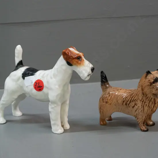 2 small dog figures - Beswick terrier and a larger Royal Doulton Airedale with a repaired back leg H-100 L-120
