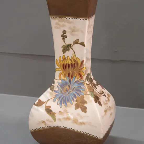 vintage square faceted footed vase with raised enamel & gilt chrysanthemum decoration, marked Doulton with signature
