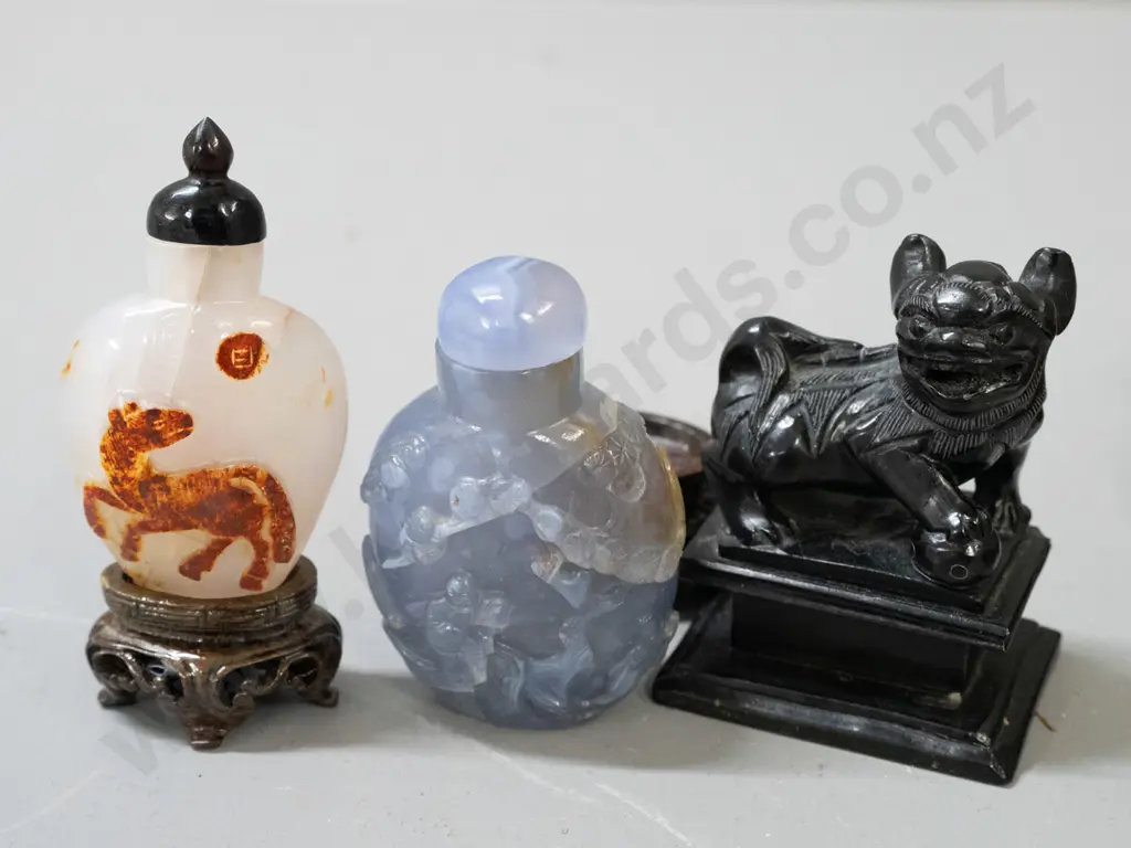 Chinese carved wooden figure of woman with scroll, small black stone or faux stone foo dog and 2 scent bottles on stands Image 1++