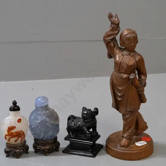 Chinese carved wooden figure of woman with scroll, small black stone or faux stone foo dog and 2 scent bottles on stands