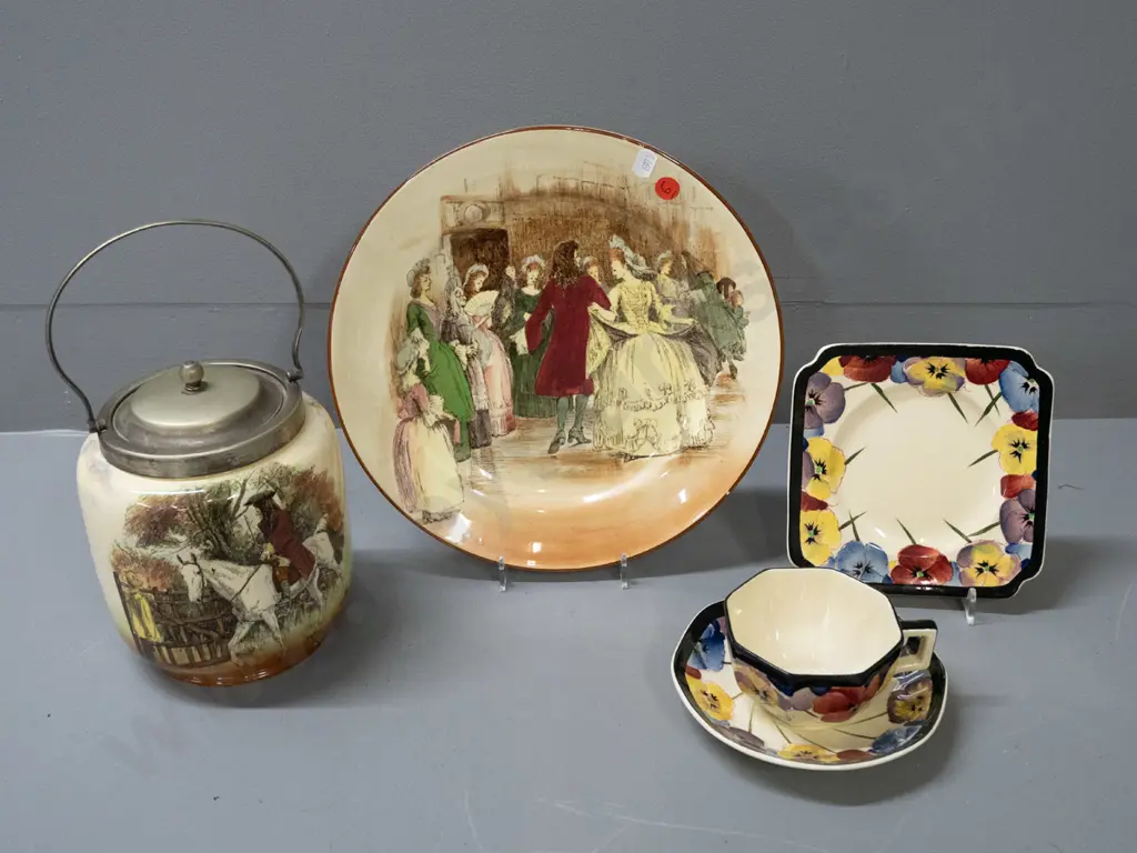 3 Royal Doulton items - Sir Roger de Coverley plate and biscuit barrel with plated lid and handle, and a deco pansy Image 1++