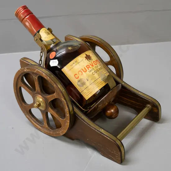 700ml bottle of Courvoisier Three Star cognac in retro cannon-themed mixed timber and brass carriage L-250