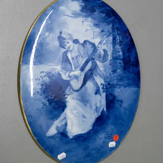 Royal Doulton "Blue Children" series blue & white oval wall plaque with gilt edging - has repaired chip to edge, hanging
