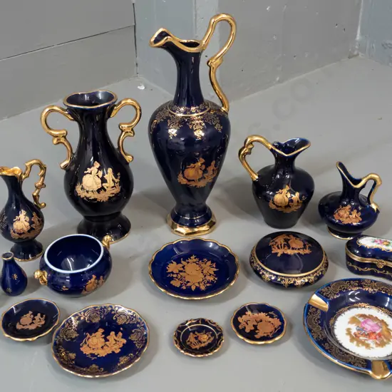 assorted blue and gold Limoges china - jugs, double handled vase, ashtray, small plates etc. - largest jug H-240