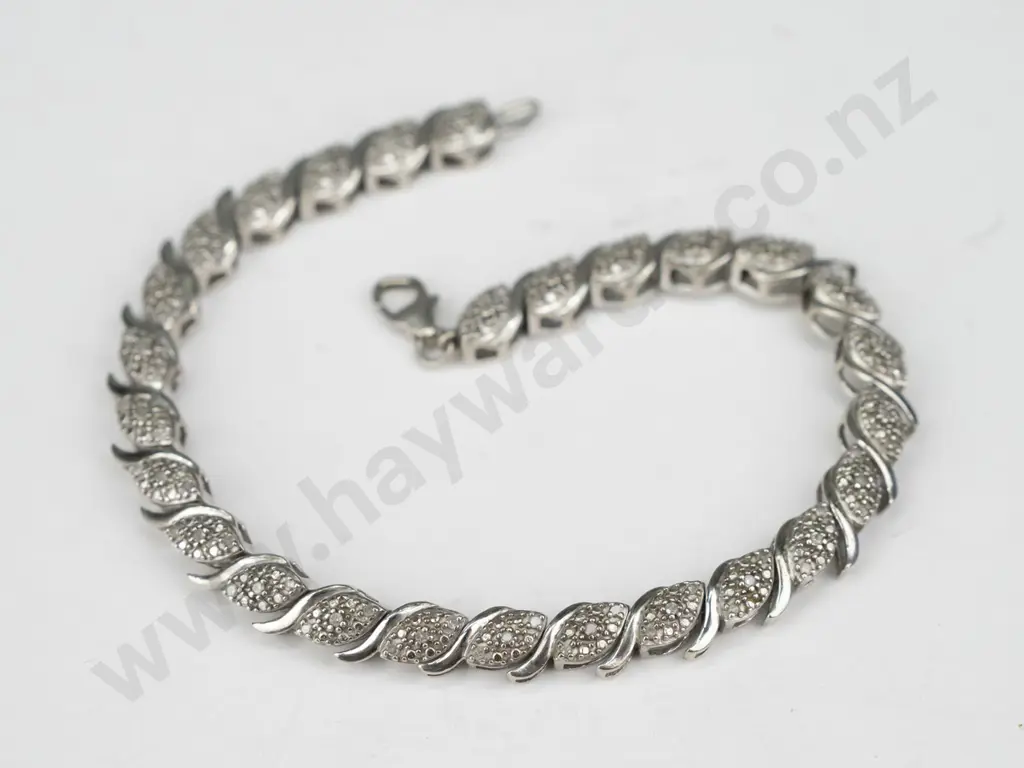 sterling silver diamond set bracelet with valuation (13.74gm) Image 1++