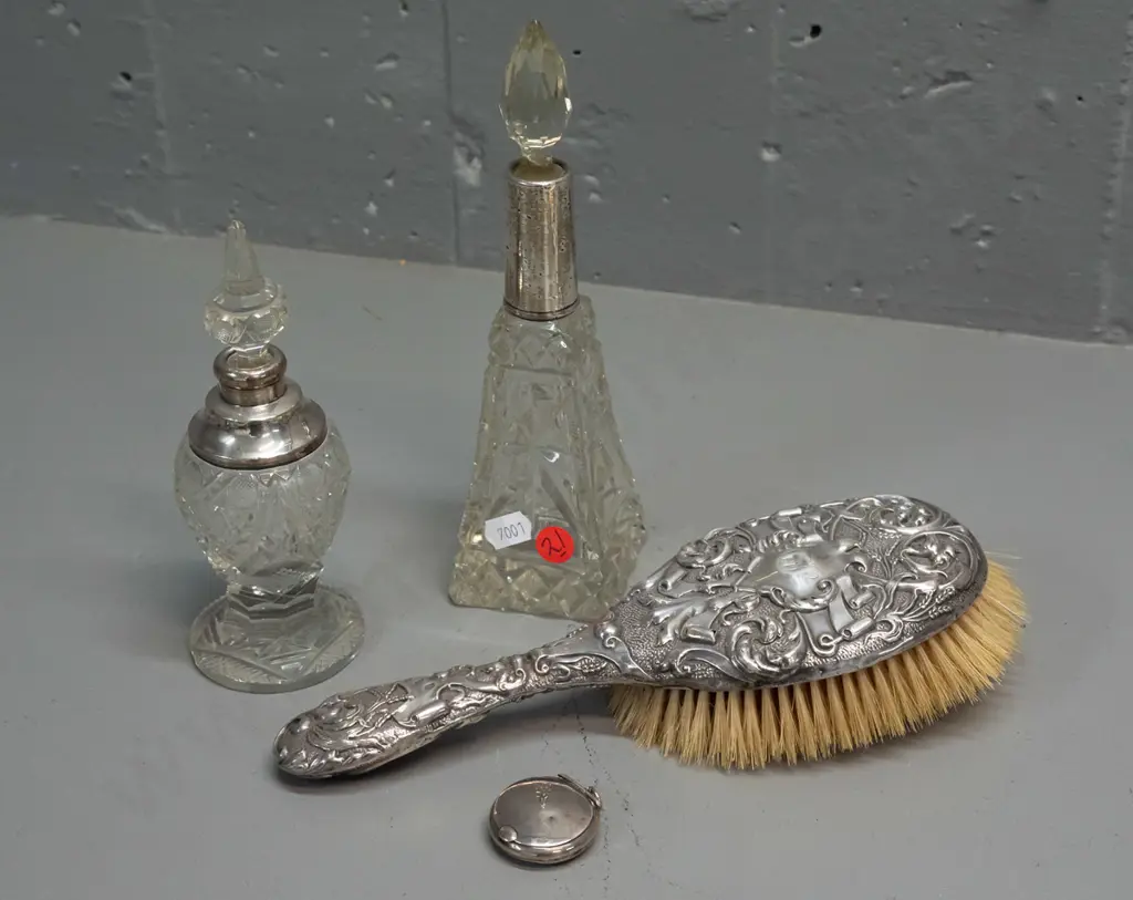 sterling silver dressing table items - 2 sterling mounted cut glass scent bottles, hair brush and miniature Image 1++