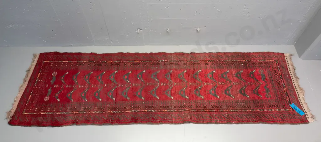 hand-knotted wool floor rug with tribal style bird motifs - some wear and colour variation L-2520 W-680 Image 1++