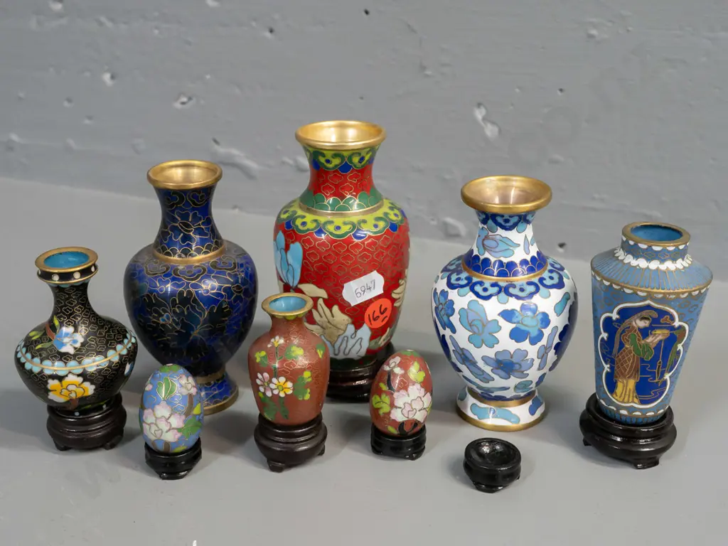 6 assorted small Chinese cloisonne vases, 4 with stands, and 2 miniature eggs on stands. Largest vase H-110. Image 1++