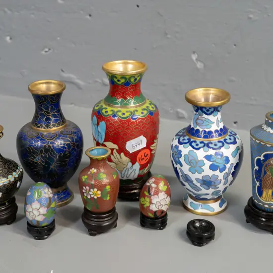 6 assorted small Chinese cloisonne vases, 4 with stands, and 2 miniature eggs on stands. Largest vase H-110.