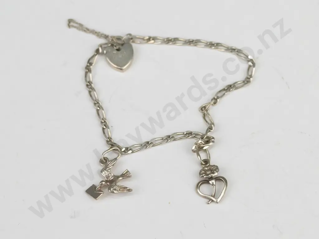 silver charm bracelet stamped 925 (5.2gm) Image 1++