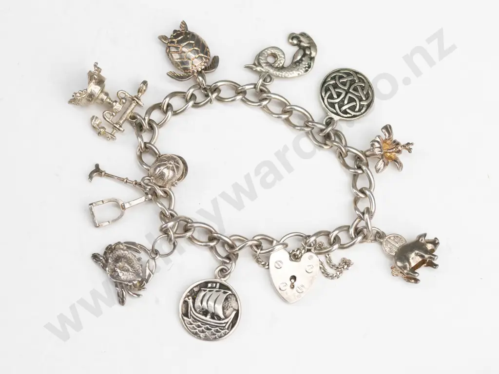 silver charm bracelet stamped sterling silver (38gm) Image 1++