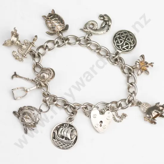 silver charm bracelet stamped sterling silver (38gm)