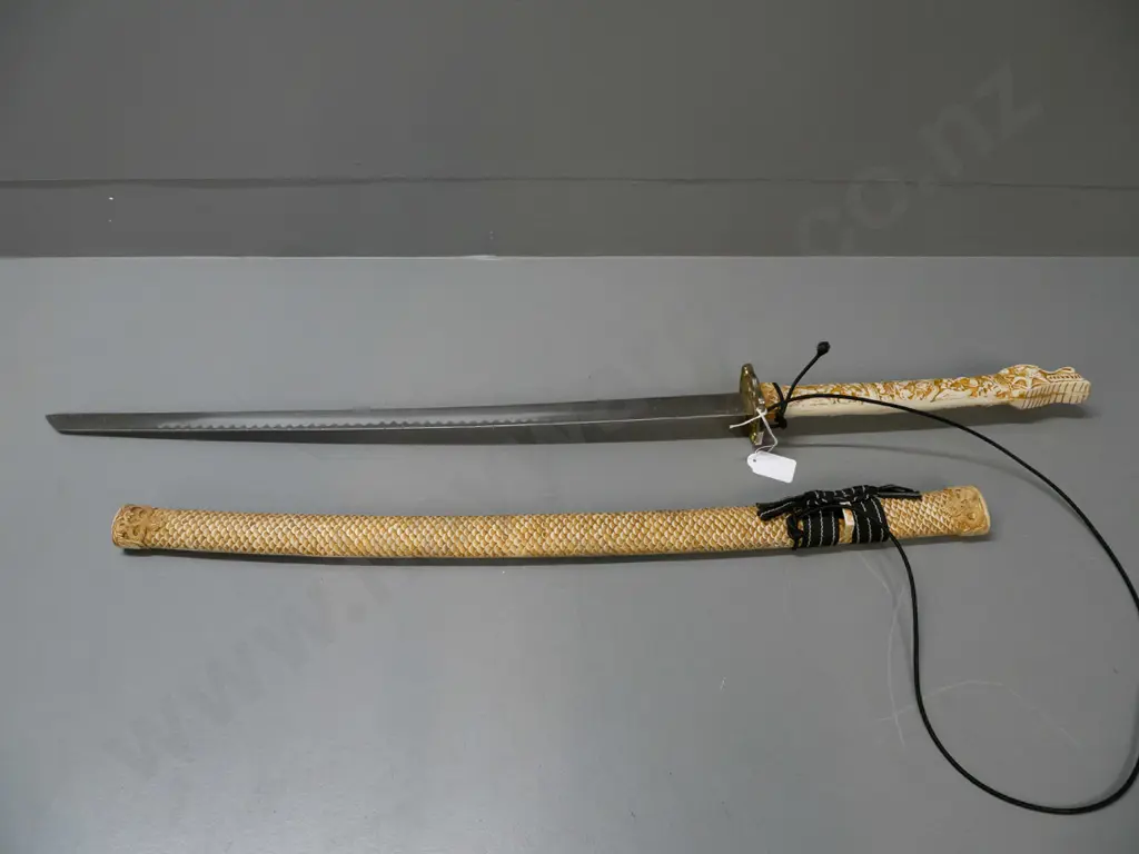 reproduction Japanese sword with composite faux-ivory handle and fish-scale pattern scabbard, brass plated hilt  - some Image 1++